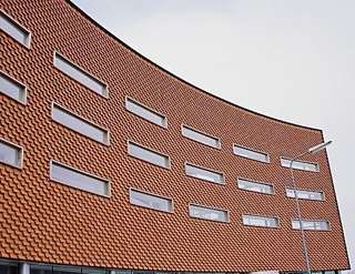 Réaliser une façade en briques à joints vifs