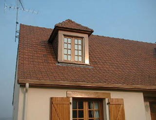 Maçonnerie et linteau en bois massif